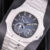 5712Amint8_5f1e2c55-9e0a-4a8b-a58d-d998925e7c8d.jpg Patek Philippe Nautilus Moon Phases 40mm 5712/1A Blue Dial