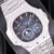 5712Amint9_db9b172c-c5c6-4bcd-8f64-5b6b6037f198.jpg Patek Philippe Nautilus Moon Phases 40mm 5712/1A Blue Dial